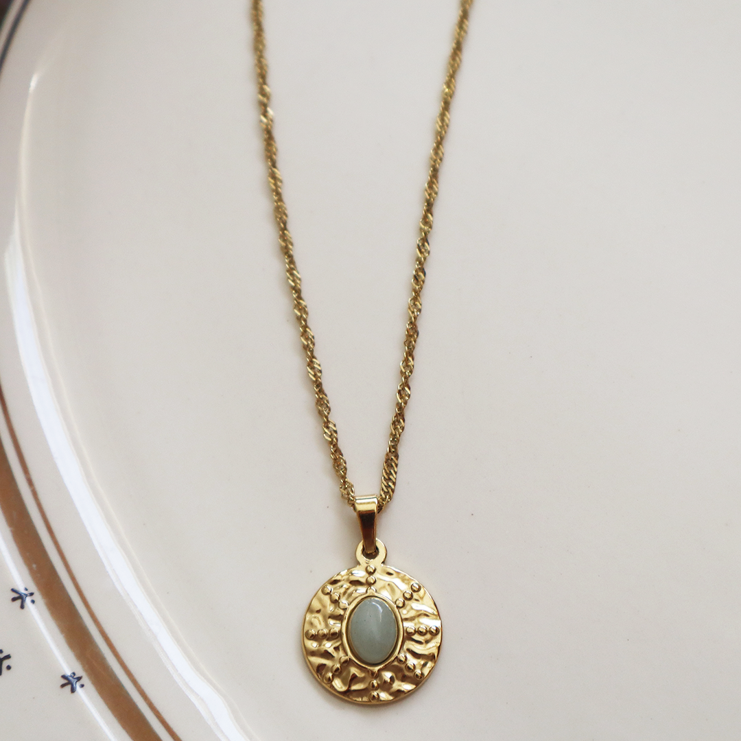 Circle Dented Pendant with Green Gemstone in 18K Gold Plated Stainless Steel